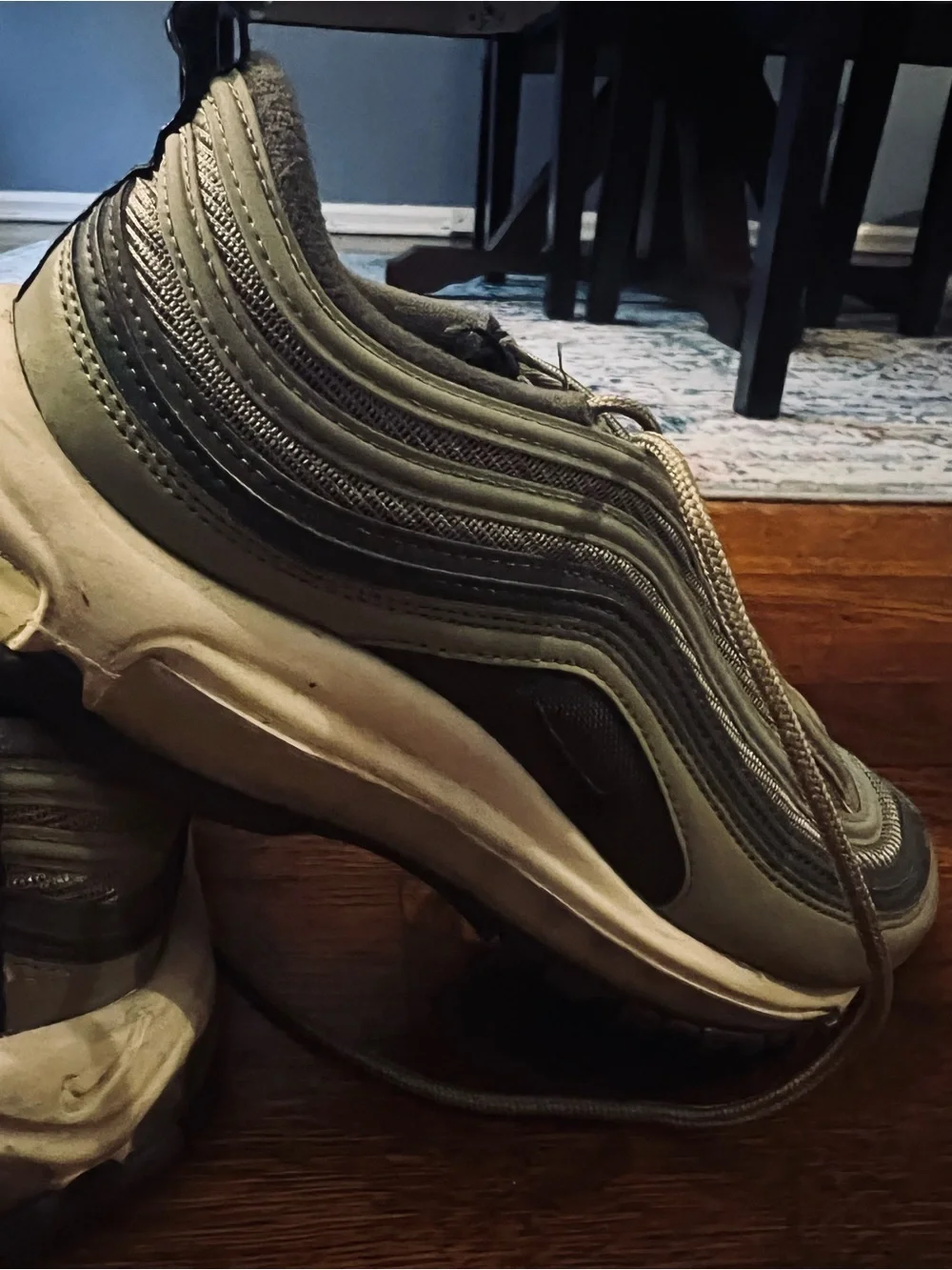 Nike women’s Air Max 97 in Olive Green . Size 8.5. Gently used.